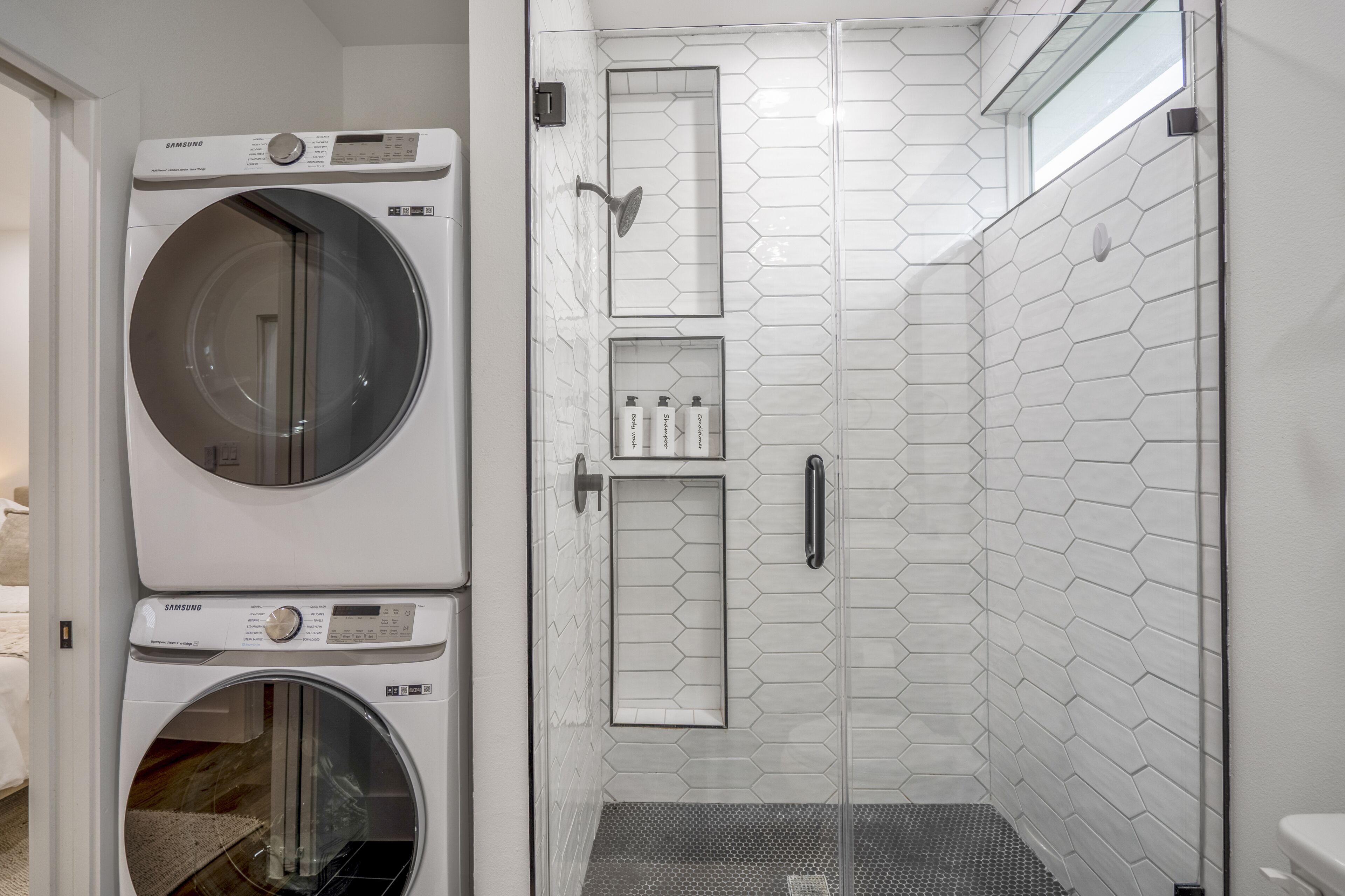 Shower, hair dryer, towels, soap