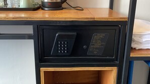A kitchenette with a coffee maker, a kettle, and a microwave. - SUPER 8 HOTEL ALOR SETAR (Alor Setar)