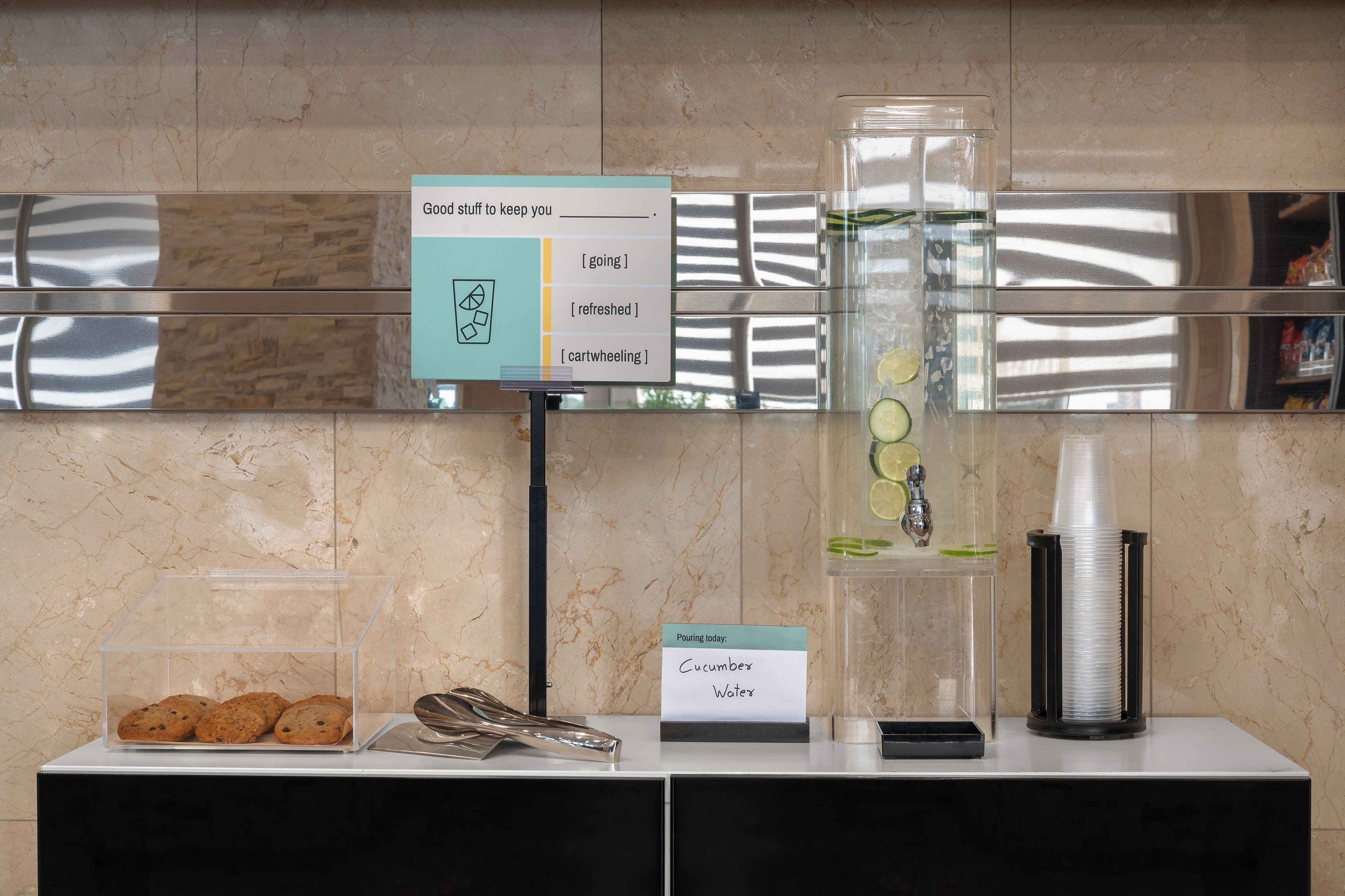 A self-serve station with a sign indicating available beverages and a note about today's offerings.