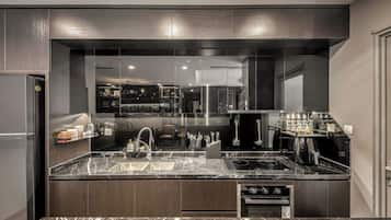 Design Apartment, 3 Bedrooms | Private kitchen | Full-size fridge, microwave, oven, stovetop