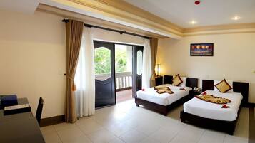 Deluxe Room, 1 Bedroom, Garden View | 1 bedroom, in-room safe, desk, laptop workspace