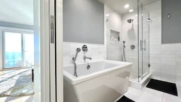Jetted tub, hair dryer, towels, soap