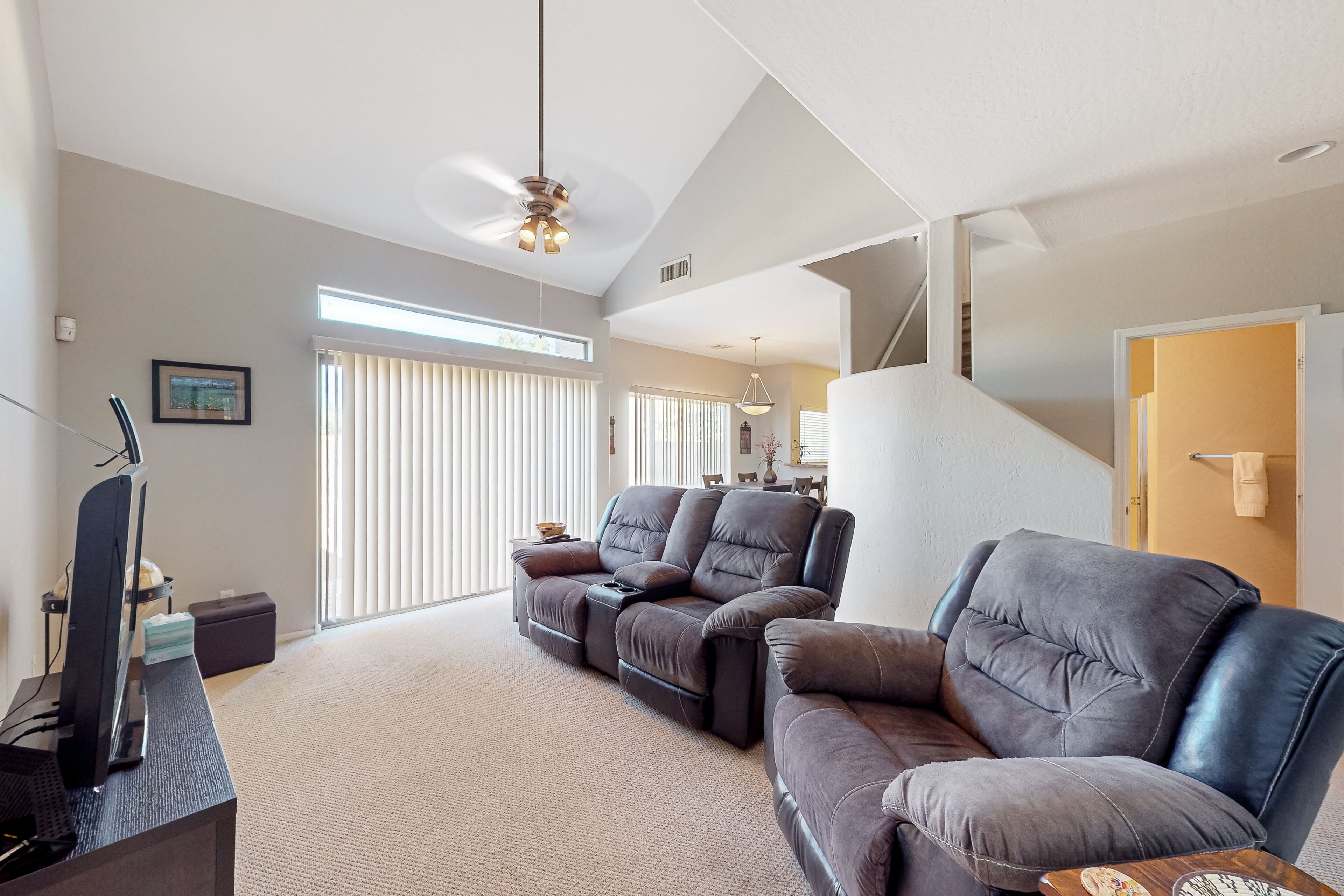 Gated community townhome with on-site pool, hot tub, patio, balcony, & W/D