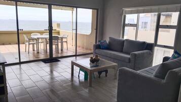 Family Apartment | Living area | Flat-screen TV