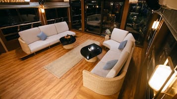 Luxury Double Room | Living area | Flat-screen TV