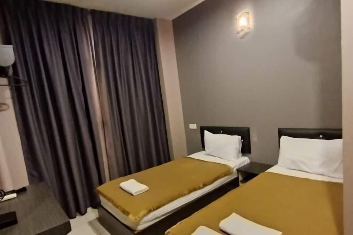 Desk, laptop workspace, WiFi (free), bed sheets