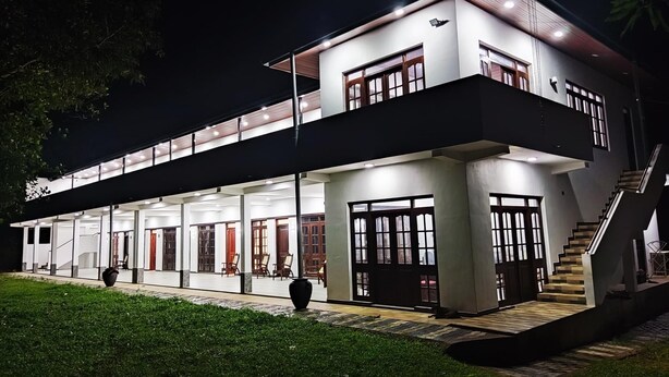 A modern two-story building with a flat roof and large windows. - Victoria Nature Resort Digana (Digana)