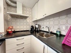 Fridge, microwave, coffee/tea maker, toaster