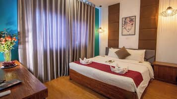 Junior Suite | 1 bedroom, minibar, in-room safe, individually decorated
