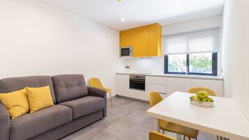 Family Apartment | Living area | 32-inch LCD TV with digital channels