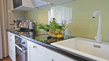 Apartment | Private kitchenette | Fridge, microwave, oven, stovetop