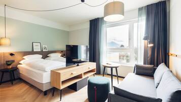 Standaard appartement | Donsdekens, een kluis op de kamer, verduisterende gordijnen