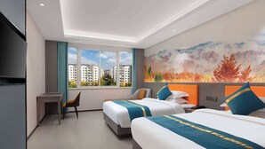 A hotel room with two beds, a desk, and a chair. There is a large window with a view of buildings and a mural on the wall. - Days Inn by Wyndham Kunming Airport Economic Zone (Kunming)