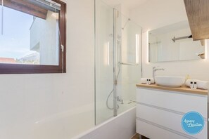 Hair dryer, towels, soap, shampoo