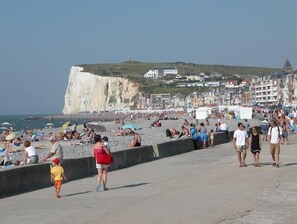 On the beach, sun-loungers
