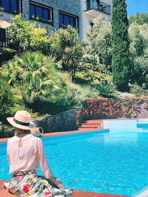 Seasonal outdoor pool, open 8:00 AM to 8:00 PM, sun loungers