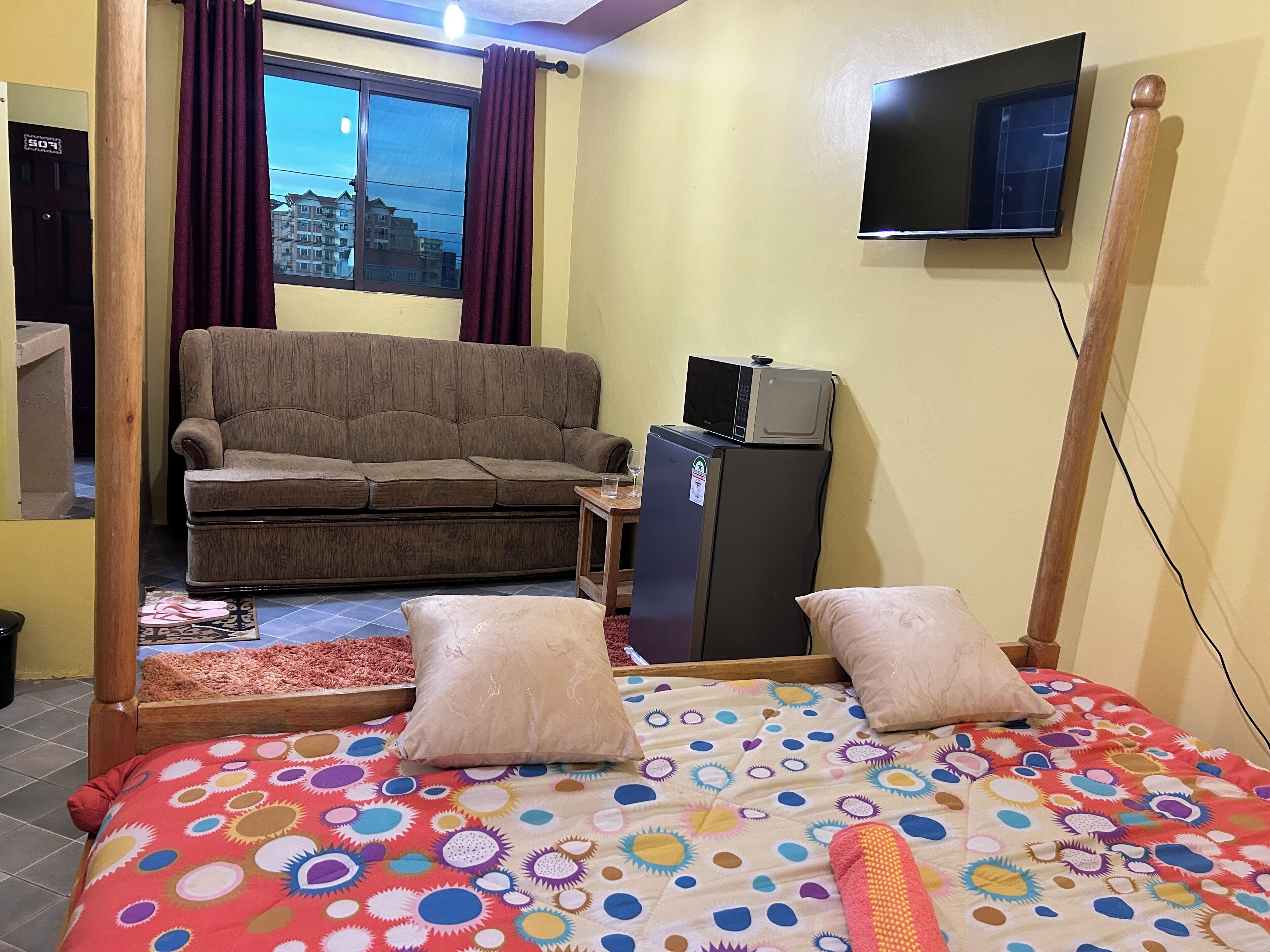Basic Room, Kitchenette, City View | Laptop workspace, blackout drapes, soundproofing, iron/ironing board