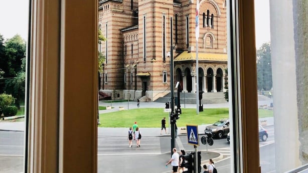 A view of a historic building with multiple towers and a central entrance. - Joy City Stay Victoriei 7G-3 (Timișoara)