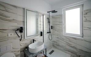A modern bathroom with a marble wall, a large window, a sink, and a shower area. - GBU Home - Olive Tween Room 206 (Timișoara)
