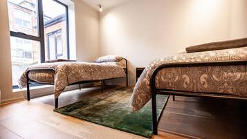 2 habitaciones, tabla de planchar con plancha y wifi gratis