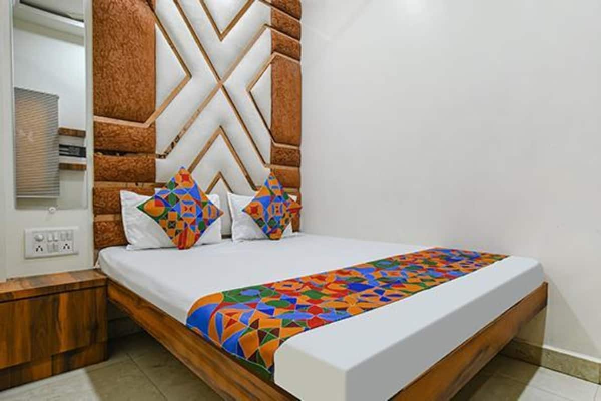 Deluxe kamer | Lakens van Egyptisch katoen, luxe beddengoed, een kluis op de kamer
