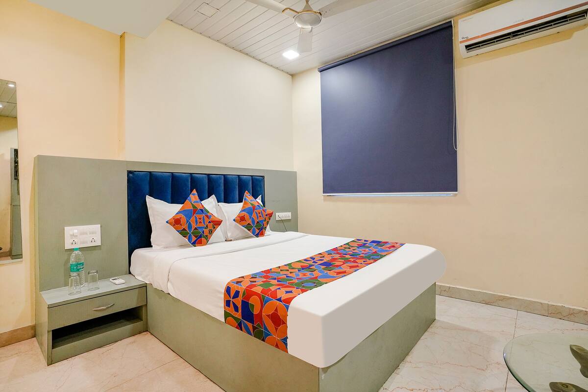 Deluxe Room | Egyptian cotton sheets, premium bedding, in-room safe