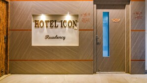 A hotel entrance with a sign reading "HOTEL ICON Residency". - FabHotel Icon (Danapur)