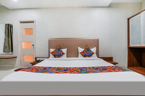 Egyptian cotton sheets, premium bedding, in-room safe, soundproofing - Fabhotel Rvg (Vadodara)