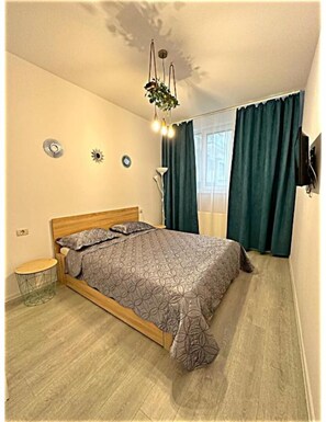 1 habitación, tabla de planchar con plancha, wifi y ropa de cama 