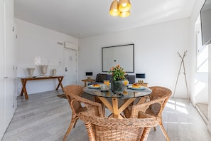 Family Apartment, 1 Queen Bed with Sofa bed, Air conditioning | Living area | 32-inch flat-screen TV with satellite channels