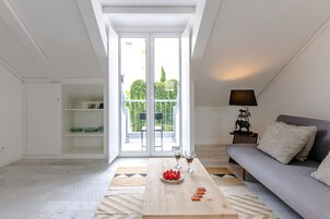 Exclusive Apartment | Living area | 32-inch flat-screen TV with satellite channels