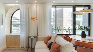 Exclusive Apartment | Living area | 43-inch Smart TV with satellite channels