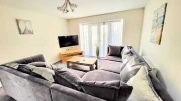 Standard House | Living area | 50-inch Smart TV with digital channels