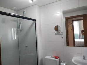 Shower, towels, soap, toilet paper
