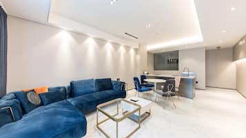 Premium bedding, free minibar items, desk, laptop workspace