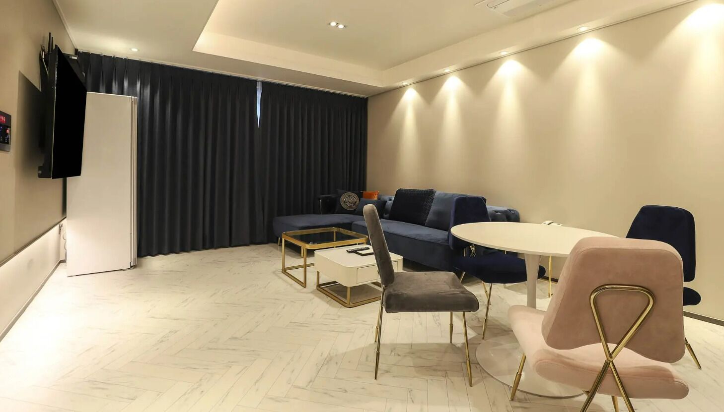 Premium bedding, free minibar items, desk, laptop workspace