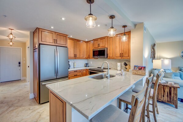 Fridge, microwave, oven, stovetop - Sea Grape Bay #303 - Cozy Bay-View Home with Screened-in Lanai (Fort Myers Beach)