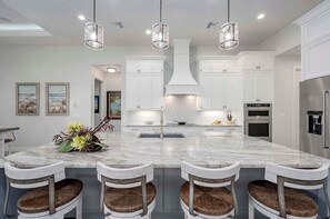 Fridge, microwave, oven, stovetop - Mystique - Luxury Waterfront Home (Cape Coral)