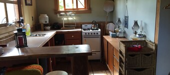 Cozy Cabin on a small Off Grid Homestead