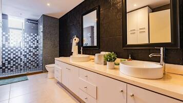 Shower, hair dryer, towels, soap