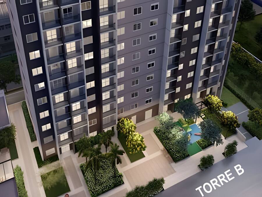 A high-rise residential building with multiple balconies and a rooftop garden.