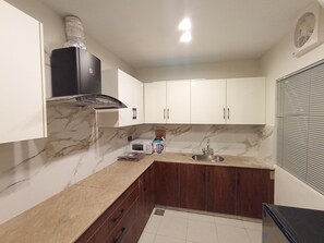 Fridge, microwave, oven, stovetop - Luxury Furnished Apartment In Lahore (Lahore)