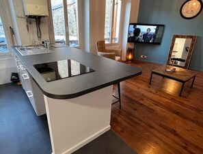 Fridge, microwave, stovetop, coffee/tea maker