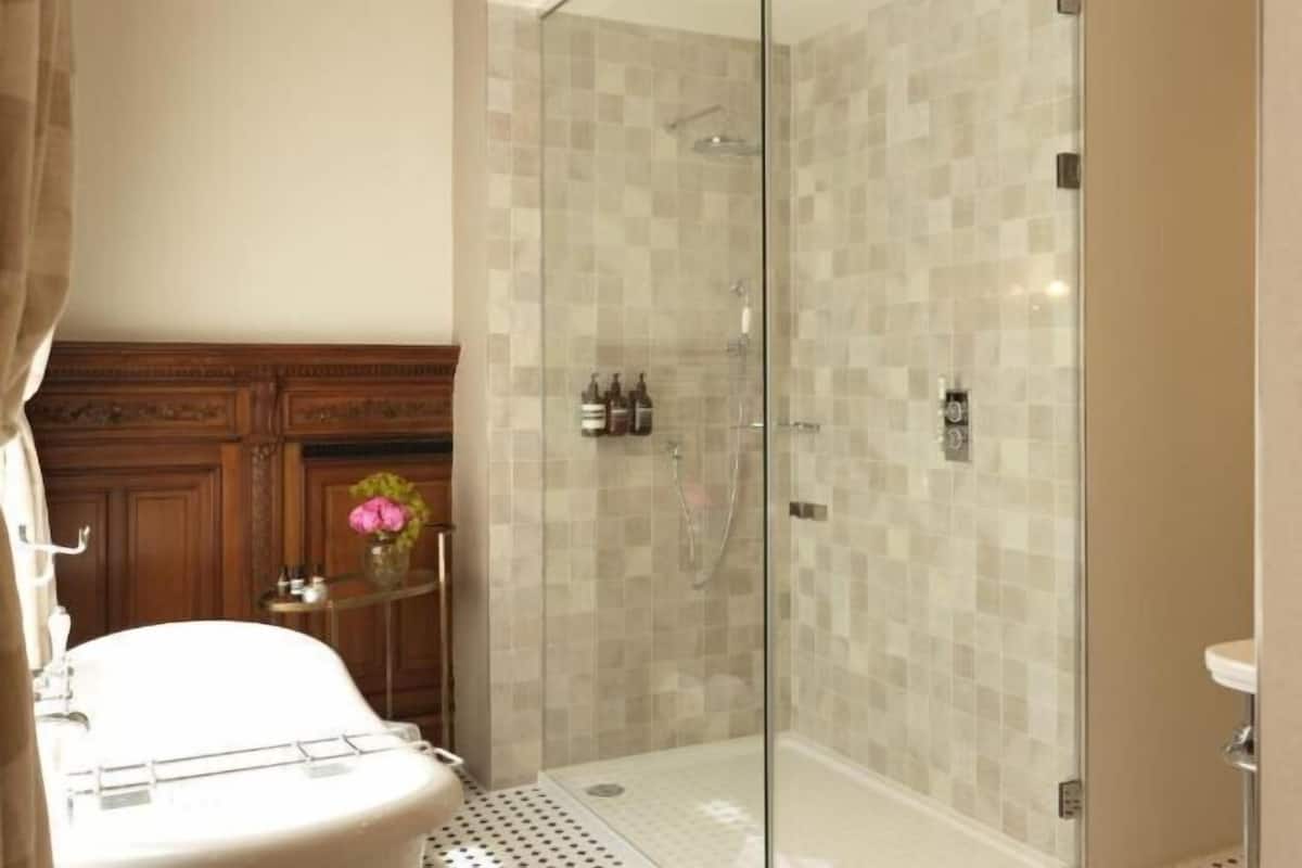 Bathroom | Hair dryer, bathrobes, towels, soap