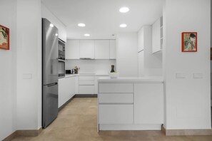 Fridge, microwave, oven, stovetop - Stunning Infinity Pool apt by Costarentals - Ref M44 (Estepona)