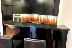Private kitchen - Ewen Shiraz Prime Apartment (Warszawa)