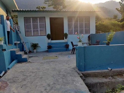 "Embrace Tranquility: The Nature View Homestay – Where Comfort Meets Wilderness"