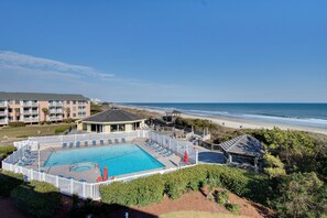 Indoor pool, outdoor pool - Cozy oceanside studio, mere steps from the beach, and close to shops and dining (Emerald Isle)