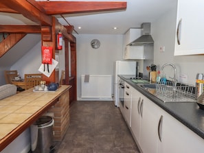 Fridge, electric kettle, toaster, cookware/dishes/utensils