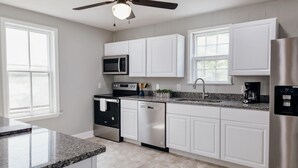 Microwave, oven, stovetop, dishwasher - Beautiful Home in Historic Waterfront District, Walk to Downtown! (Cambridge)